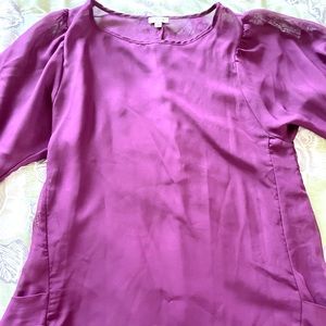 Large, long sleeve dress